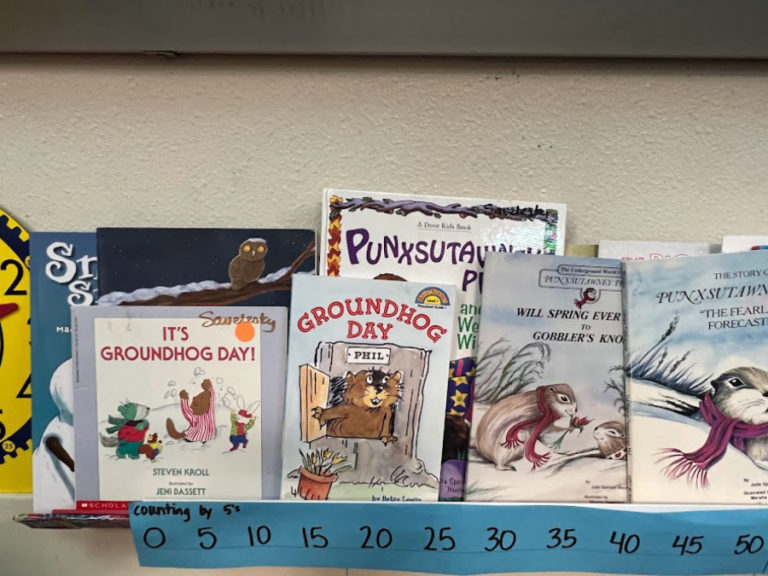 Books about groundhogs line a shelf inside Dorothy Fox Elementary School on Groundhog Day, Wednesday, Feb. 2, 2022.