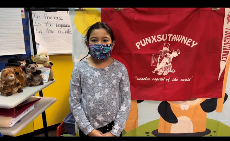 Dorothy Fox second-grader Sarah Shrestha joins in her school's celebration of Groundhog Day on Wednesday, Feb. 2, 2022.