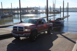 Doug Flanagan/Post-Record 
 Washougal resident Mike Amodeo lowers his boat into the Columbia River at Parker's Landing Marina on Jan. 25, 2022.