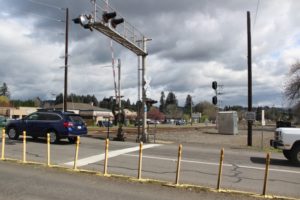 Traffic proceeds north on 32nd Street across a set of railroad tracks in Washougal on Thursday, March 31. The city of Washougal is seeking grant funding for $1,520,000 from the U.S. Department of Transportation's Rebuilding American Infrastructure with Sustainability and Equity program to offset design and engineering costs associated with the planned reconstruction of 32nd Street from Main Street and "B" Street to F Place. (Doug Flanagan/Post-Record)