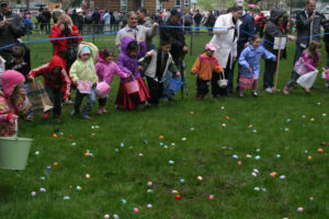 Eager children dash to collect candy- and prize-filled eggs at the Camas Parks and Recreation's 2016 Easter egg hunt at Crown Park. (Post-Record files)