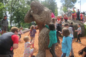 Children play near the Eegah the Sasquatch sculpture at the natural play area at Washougal Riverfront Park in June 2019. (Post-Record files) 