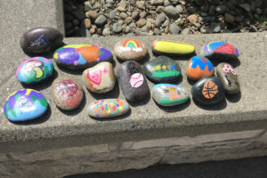 Doug Flanagan/Post-Record 
 Washougal residents Rich Beck and Kathy Dering will drop more than 100 painted rocks, including the ones pictured above, into the the Washougal Children's Rock Garden, the city's first interactive art installation created by children, on Saturday, May 14.