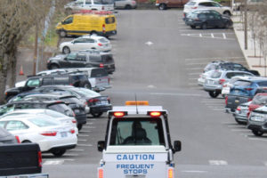 A Camas code enforcement officer drives on Northeast Birch Street in downtown Camas on March 28, 2022. (Kelly Moyer/Post-Record)