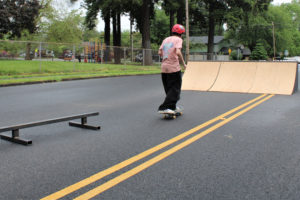 Brody Paulson, 14, skates toward a ramp contributed by Kevin Barber, of the Camas-based Core Industries, during a skateboarding demonstration at the Camtown Youth Festival at Crown Park in Camas on Saturday, June 4, 2022. (Kelly Moyer/Post-Record) 