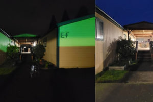 Washougal School District facilities, maintenance and grounds manager Jessica Beehner took "before and after" photos outside Hathaway Elementary School's portable buildings to show what the area looked like "before," in 2021, (left) and after the district installed LED lights in 2022 (right). (Contributed photos courtesy of Jessica Beehner)