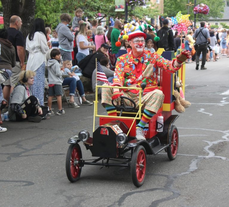 A clown rides in the 2022 Camas Days Grand Parade Saturday, July 23, 2022.