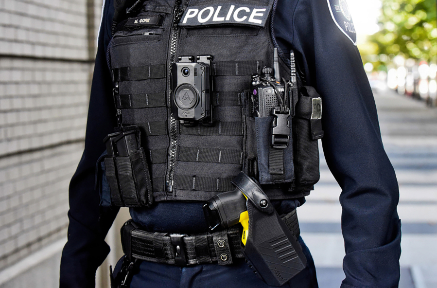 Contributed photo courtesy of AXON 
 An officer models the type of AXON body-worn camera and taser Camas police officers began wearing in April 2022. The city of Washougal is hoping to launch a body-worn camera program of its own in early 2023.