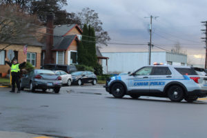 A Camas police officer responds to a vehicle crash in downtown Camas on Nov. 23, 2021. (Kelly Moyer/Post-Record files)