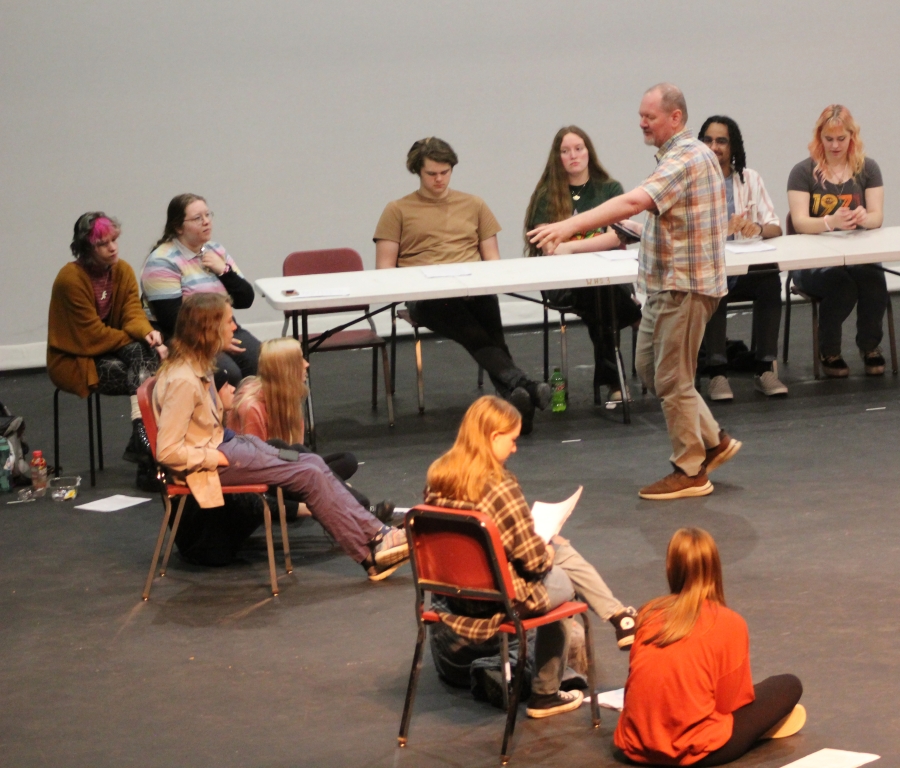 Washougal High School drama teacher Kelly Gregersen (center, standing) talks to students on Thursday, Feb. 2, 2023, during a rehearsal for Washougal High School's upcoming "Oh, What a Knight" Renaissance dinner theater production set for 6 p.m. Friday and Saturday, Feb. 17-18. (Photos by Doug Flanagan/Post-Record)