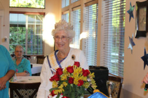 Maxine Ambrose is crowned the 2018 Camas Days Queen during a coronation and dessert reception at Columbia Ridge Senior Living in Washougal on July 18, 2018. (Kelly Moyer/Post-Record files)