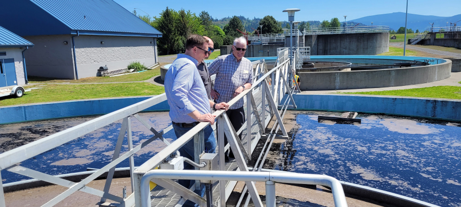 Contributed photo courtesy Max Wedding/Washington State Public Works Board 
 Rep. Kevin Waters (front) and Washington State Public Works Board vice chair Gary Rowe (back) tour the city of Washougal's wastewater treatment plant earlier this year.