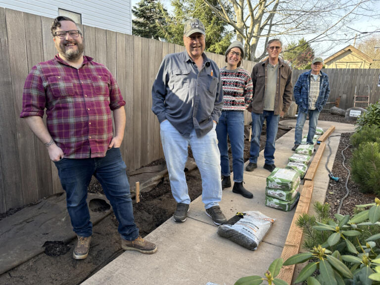 (Left to right): Clark County Historical Museum Executive Director Brad Richardson, John Kimbrough, Katie Bush, Ivar Godtilbsen and Richard Johnson gather outside the Two Rivers Heritage Museum in Washougal, March 8, 2024.