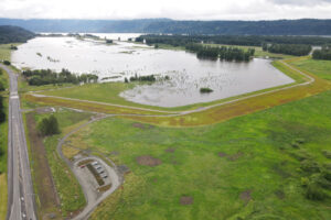 The setback levees constructed during the Steigerwald Reconnection Project between 2020 and 2021, kept water from flooding Port of Camas-Washougal property in 2022. (Contributed photo courtesy of the Lower Columbia Estuary Partnership)