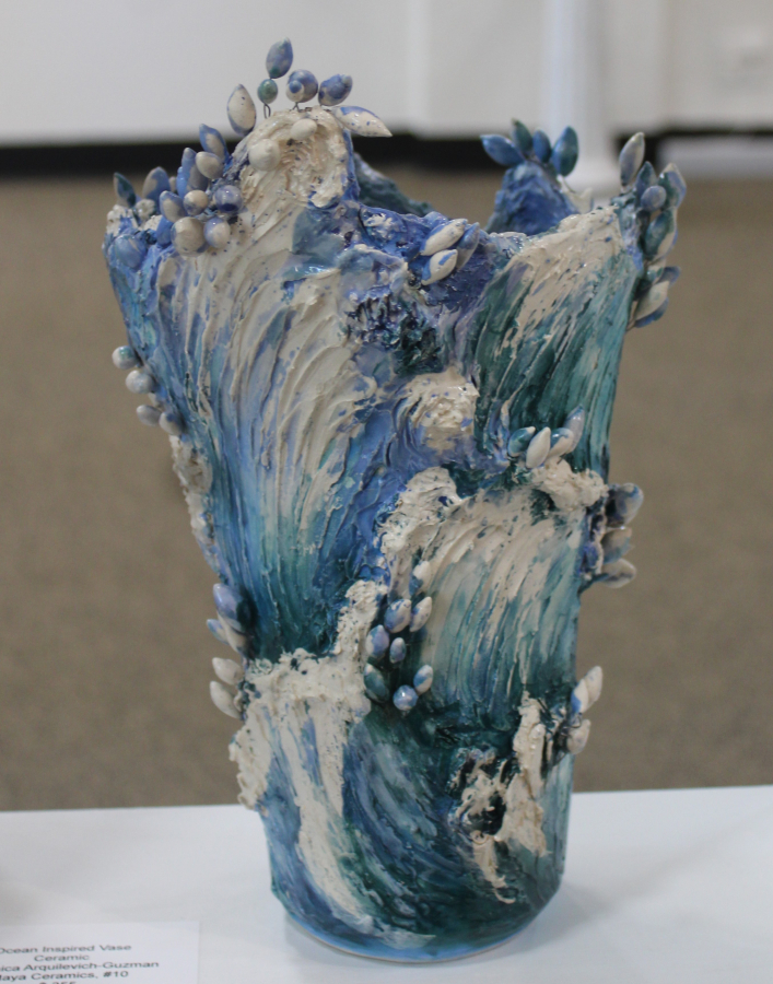 An ocean-inspired ceramic vase by Portland artist Veronica Arquilevich Guzman is displayed inside Gallery 408 in downtown Camas during the new gallery's grand opening event, Friday, May 31, 2024.