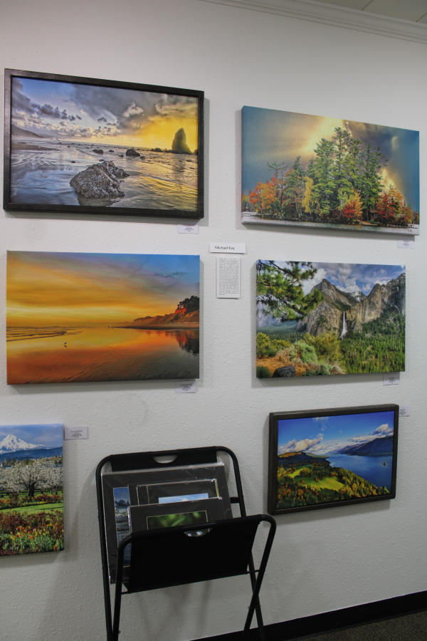 Photos by artist Michael Kay hang inside Gallery 408 during the gallery's grand opening, Friday, May 31, 2024.