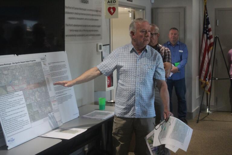 Doug Flanagan/Post-Record 
 Camas resident Jim Keller talks about the Port of Camas-Washougal&#039;s request to annex its Grove Field properties into Clark County&#039;s urban growth boundary during an open house on June 5, 2024.