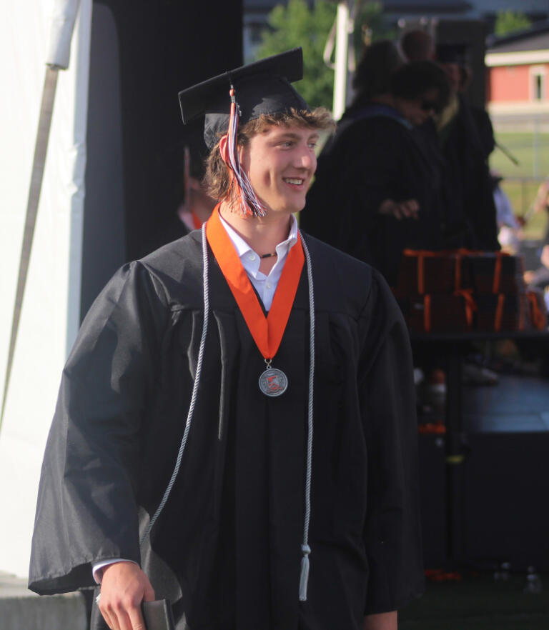 Doug Flanagan/Post-Record 
 A Washougal High School smiles after receiving a diploma during the school&#039;s Class of 2024 graduation ceremony on June 8, 2024, at Fishback Stadium.