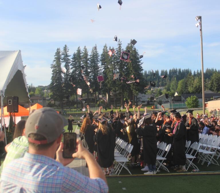 Doug Flanagan/Post-Record 
 Washougal High School graduates throw their caps into the air at the conclusion of the school&#039;s Class of 2024 graduation ceremony on June 8, 2024, at Fishback Stadium. (Doug Flanagan/Post-Record)