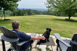 A rural Washougal resident enjoys the view from his patio in an undated photo. (Contributed photo courtesy of Sherri Irish)