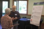 Camas City Administrator Doug Quinn (right) talks to an attendee during the City's "Our Camas 2045" community forum, held at Lacamas Lake Lodge, June 12, 2024.