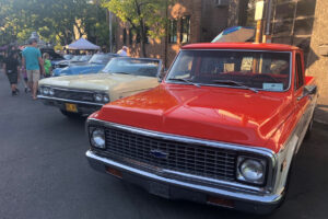 Kelly Moyer/Post-Record files 
 Visitors inspect classic cars at the Camas Car Show in downtown Camas, June 29, 2019. (Kelly Moyer/Post-Record files)