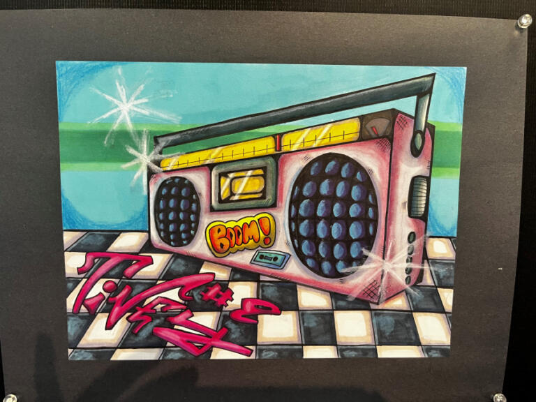 Artwork by Hayes Freedom High School student Olivia Thomas, created using micron pens, alcohol markers and oil pastels, hangs inside the Second Story Gallery in Camas, Tuesday, July 2, 2024. The gallery, located inside the Camas library, will host youth artists through August.