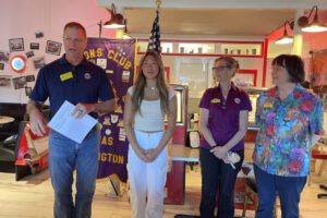 The Camas Lions Club awards Emily Shin (second from left) with a $2,000 scholarship, June 6, 2024, at Natalia’s Cafe in downtown Camas. Pictured from left to right: Casey O’Dell, Shin, Peggy Liggit and Sherry Keene. The Camas Lions also awarded a $2,000 scholarship to recent Camas high school graduate Maria Navarro (not pictured). (Contributed photo courtesy of the Camas Lions Club)