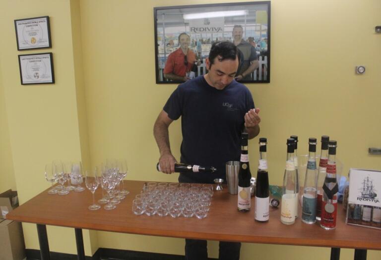 Rediviva Distilling&rsquo;s lead distiller, Daniel Ruiz, pours the distillery&rsquo;s Cherry Brandy into a shaker cup at the Washougal distillery, July 11, 2024.