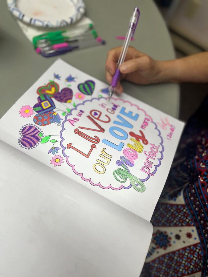 A Recovery Cafe of Southwest Washington participant works on an art project inside St. Anne's Episcopal Church in Washougal, Monday, July 15, 2024.