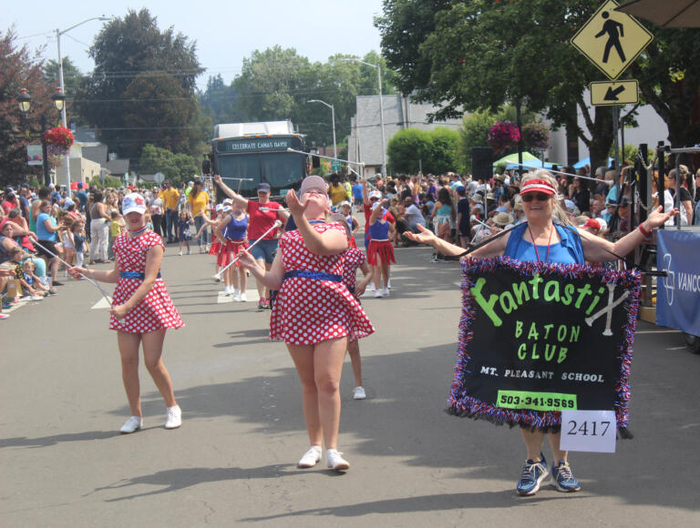 Members of the Mount Pleasant School's Fantastix Baton Club perform during the Camas Days festival grand parade on Saturday, July 27, 2024. (Doug Flanagan/Post-Record)