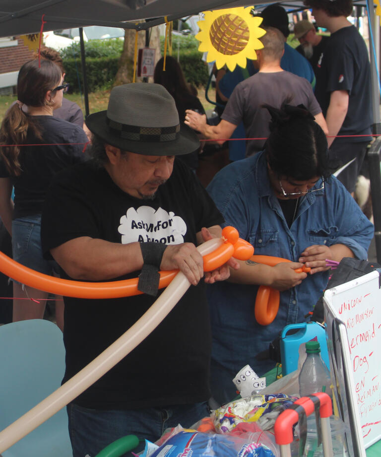 Vendors create balloon animals during the Camas Days festival on Saturday, July 27, 2024. (Doug Flanagan/Post-Record)