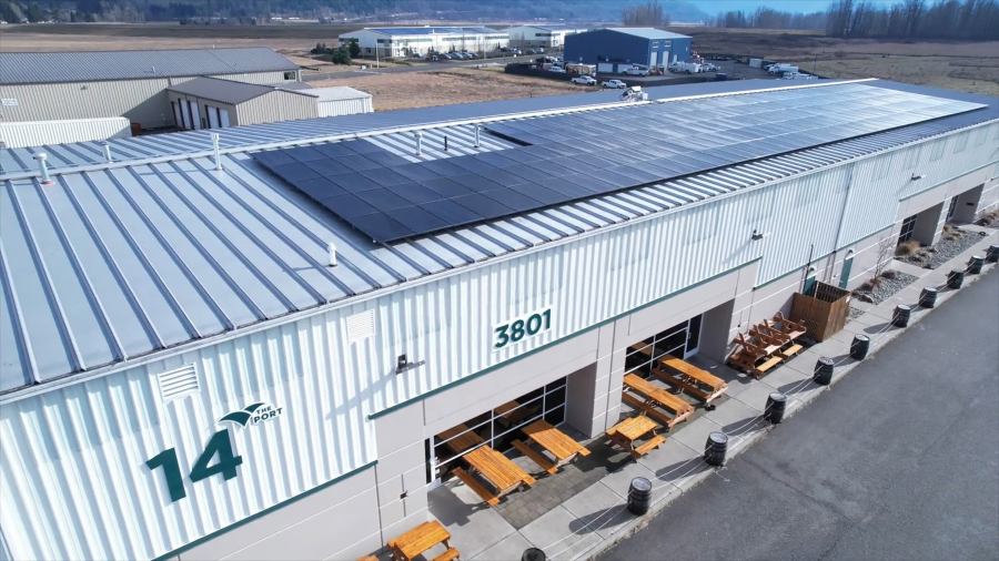 Clark Public Utilities installed solar panels on the roofs of five buildings, including Building 14 (above), at the Port of Camas-Washougal’s industrial park in late 2023 and early 2024. (Contributed photo courtesy of the Port of Camas-Washougal)