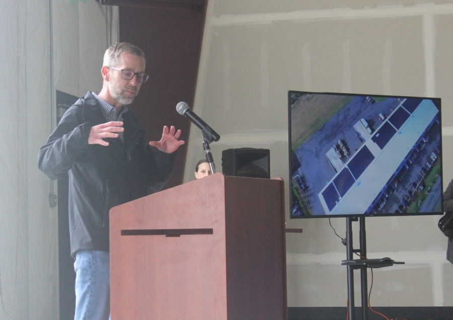 Matt Babbitts, Clark Public Utilities’ energy resources program manager, speaks during a celebration event for the Community Solar East project at the Port of Camas-Washougal’s  Building 20 on March 27, 2024. (Doug Flanagan/Post-Record)