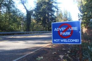 An “Adventure Park Not Welcome Sign” is staked into the ground on the west side of Washougal River Road near the Cape Horn-Skye Elementary School/Canyon Creek Middle School campus in Washougal on Saturday, Oct. 28, 2023. (Doug Flanagan/Post-Record files)