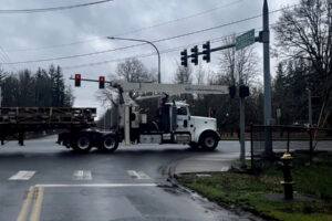 Vehicles pass through an intersection Monday, March 4, 2024, near the site of a proposed gas station-convenience store and car wash at 20101 N.E. 13th St., Camas. (Kelly Moyer/Post-Record files)