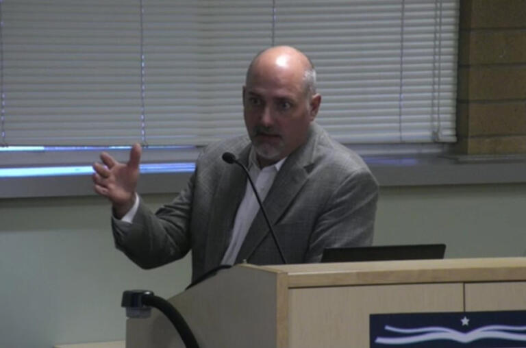 Camas School District Business Services Director Jasen McEathron addresses the Camas School Board during the Board's regular meeting, Monday, Aug. 26, 2024.