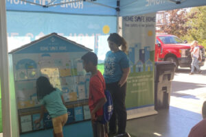 Visitors to the Camas-Washougal Fire Department's 2022 open house and Health and Safety Fair browse the NW Natural emergency preparedness booth. (Contributed photo courtesy of Northwest Natural)