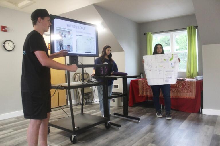 Washougal High students Hunter Hardin (left), Olivia Alvarez (center) and Joselyn Guajardo speak Aug. 22, 2024, during a Unite! Washougal meeting at the East County Family Resource Center.