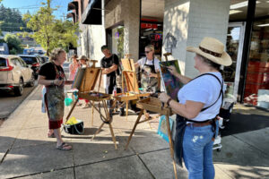 Artists paint outdoors during the 2023 September First Friday “Plein Air” art event in Camas. This year’s “plein air” event will take place from 9 a.m. to 4 p.m. Friday, Sept. 6, throughout downtown Camas, ahead of the 5 to 8 p.m. First Friday festivities. (Contributed photo courtesy of the Downtown Camas Association)