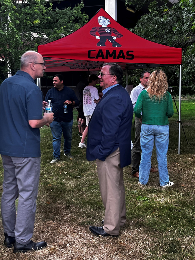 Camas Mayor Steve Hogan (center) talks to community members during the Camas School District's open house and tour of its Leadbetter campus, located at the former Underwriters Laboratories (UL) site on Northwest Leadbetter Drive in Camas, on Tuesday, Sept. 10, 2024.