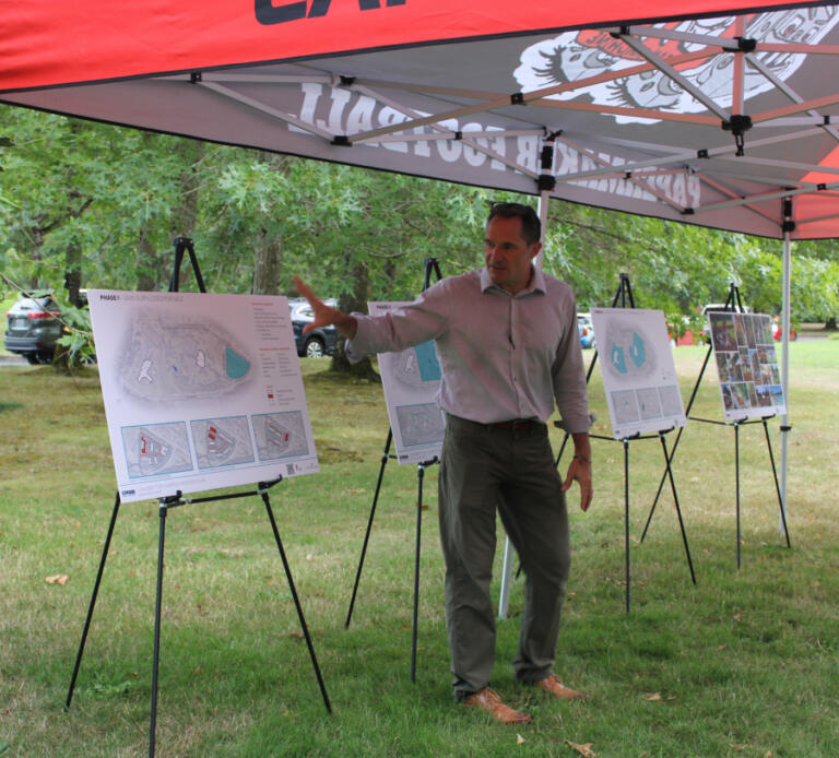 A consultant for the Camas School District speaks to community members during the school district's open house and tour of its Leadbetter campus, located at the former Underwriters Laboratories (UL) site on Northwest Leadbetter Drive in Camas, on Tuesday, Sept.