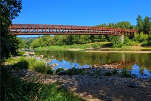 A pedestrian bridge crosses the Washougal River along the Washougal River Greenway trail in Camas in an undated photo. (Contributed photo courtesy of Camas Police Department)