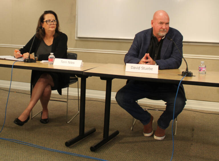 Candidates running for Washington's 17th Legislative District, Position 2 seat, Terri Niles, a Democratic candidate from Vancouver (left) and Washougal Mayor David Stuebe (right), who is running as a Republican, attend a League of Women Voters of Clark County candidate forum at the Camas Public Library, Saturday, Oct. 5, 2024.