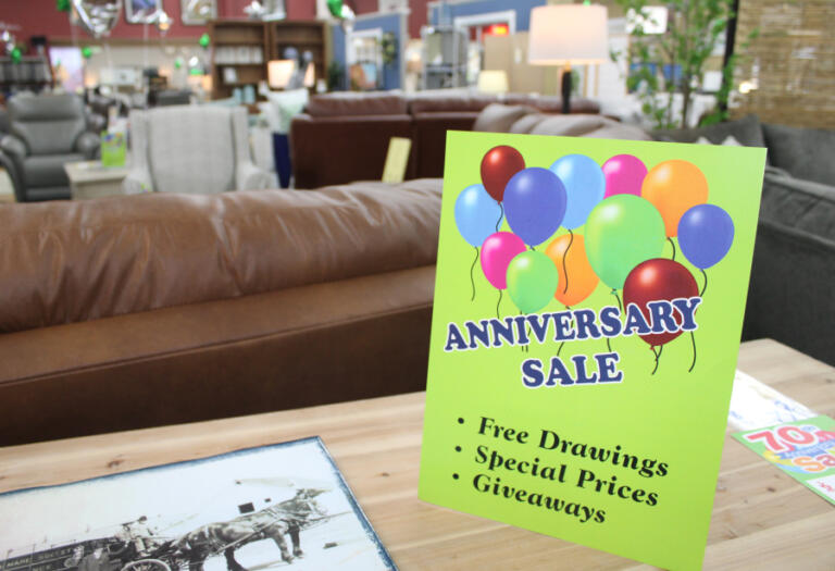 A sign inside the One Stop Home Furnishings store in Camas alerts customers to the store's 70th anniversary sale, Monday, Oct. 14, 2024.