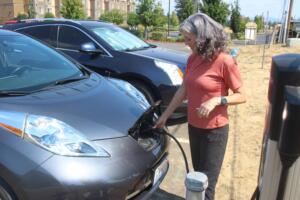 Port of Camas-Washougal Commissioner Cassi Marshall charges her electric vehicle at the Port’s administrative office, near the Washougal waterfront, in August 2022. (Doug Flanagan/Post-Record files)