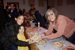 Downtown Camas Association volunteerSusan Lehr (right) helps serve pie at the DCA’s 2023 “Thankful for Pie” First Friday event held the first Friday in November 2023. (Contributed photos courtesy of the Downtown Camas Association)