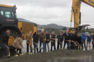 Public officials, including Port of Camas-Washougal Commissioners Larry Keister, John Spencer and Cassi Marshall, former Port Chief Executive Officer David Ripp, Washougal Mayor David Stuebe and Camas Mayor Steve Hogan, along with RKm Development employees, break ground on the Hyas Point mixed-use development project on Thursday, Oct. 31, 2024. (Photos by Doug Flanagan/Post-Record)