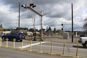 Traffic proceeds north on 32nd Street across a set of railroad tracks in Washougal, March 31, 2022. (Doug Flanagan/Post-Record files)