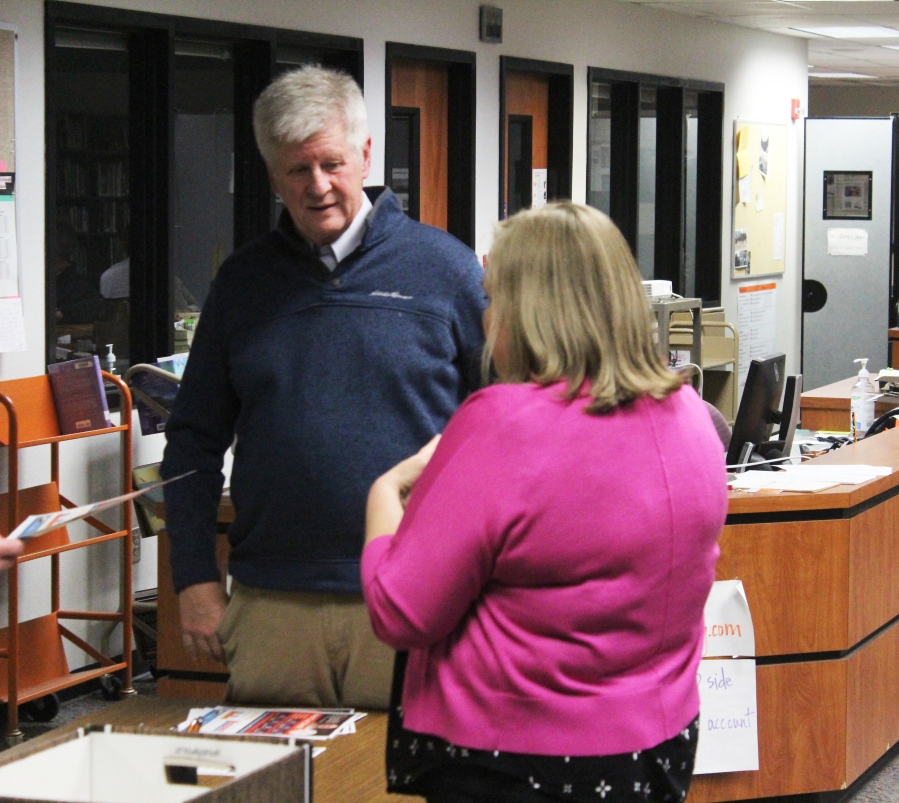 Washougal School Board member Jim Cooper (left) attends a school district listening session in 2023. Cooper has called for more transparency from the Washougal School District, which he claimed failed to provide important information to the Board in a timely manner in 2024. (Post-Record file photo)